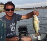 Karl Pflum caught another fish in a fishing boat!